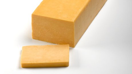 Cheddar rouge jeune en pain 34,9% MG 5 kg env. | Grossiste alimentaire | PassionFroid